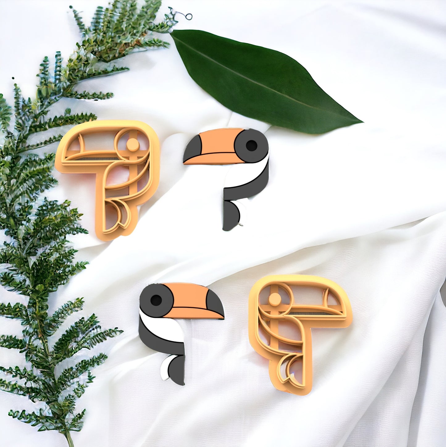 Cortador tucan para hacer pendientes de arcilla polimerica {son dos}