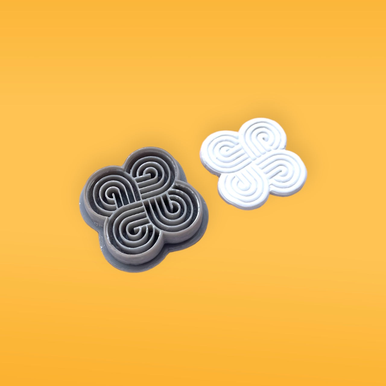 Nós Um cortador de argila de polímero