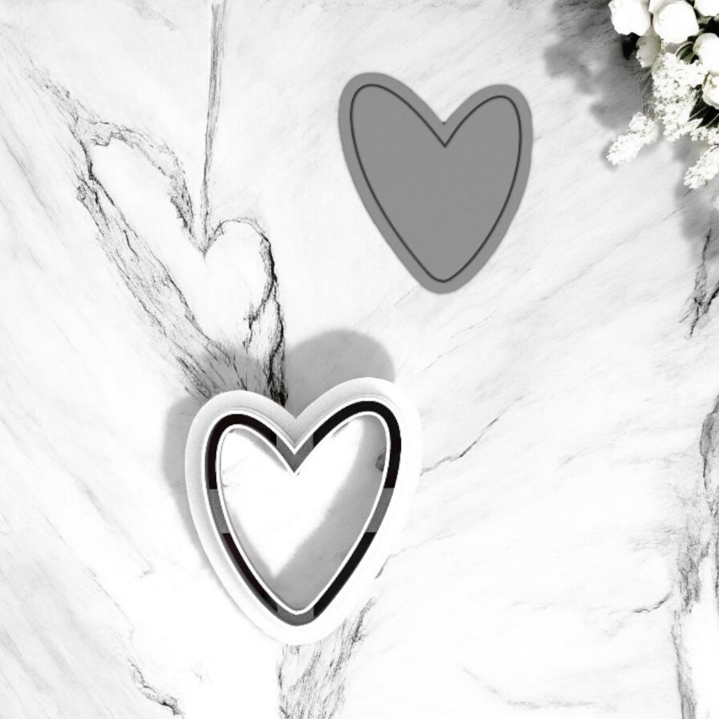 Corazón con linea - Cortador para hacer pendientes de arcilla polimérica