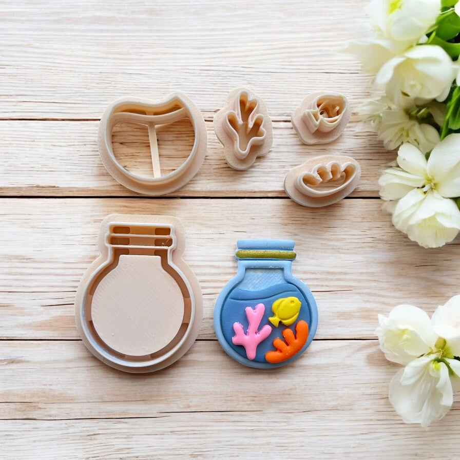 Botella de mar– Cortador para hacer pendientes de arcilla polimérica.