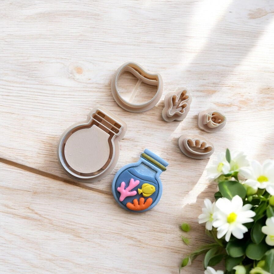 Botella de mar– Cortador para hacer pendientes de arcilla polimérica.