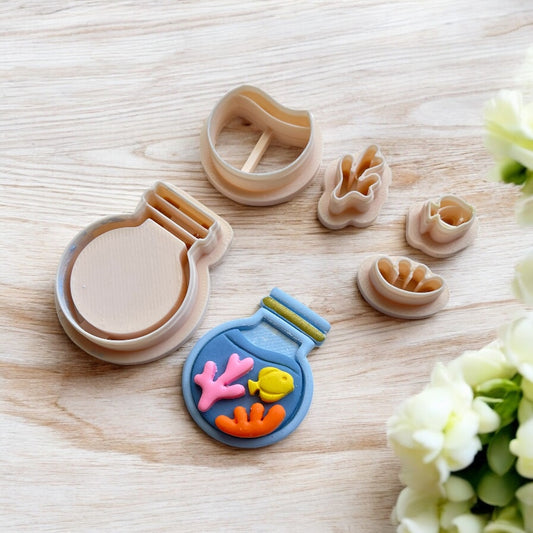 Botella de mar– Cortador para hacer pendientes de arcilla polimérica.